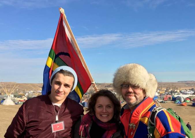 standingrocktriopicwithflag